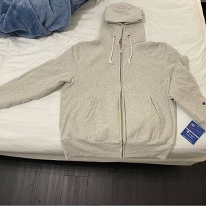 Brand new (with tag) gray Champion zip-up jacket!